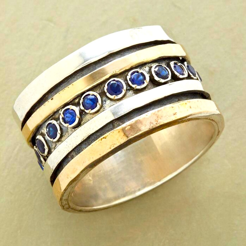 Sapphire River Spinner Ring. New with tags and box from Sundance